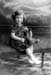 rosemary CHILD SITTING ON BENCH
